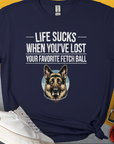 Navy tee with a German Shepherd and Life Sucks When Youve Lost Your Favorite Fetch Ball, Volume 4 text. Perfect for dog owners seeking a funny dog shirt. Designed by Dog Gang.