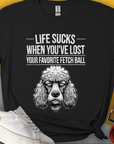 The Life Sucks When Youve Lost Your Favorite Fetch Ball, Volume 7, T-shirt features a funny drawn dissapointed poodle face and playful text. Perfect for any poodle lover gift. Designed by Dog Gang.
