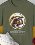 The military green Watchdog Society Series, Volume 1, Unisex T-Shirt features a 
cool dog in sunglasses looking into the distance. Made from 100% cotton. Designed by Dog Gang.