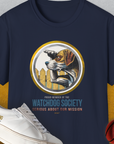 Navy unisex T-shirt in 100% cotton with a cute dog design featuring a dog with watching over the fence and the phrase Member Of The Watchdog Society. Designed by Dog Gang.