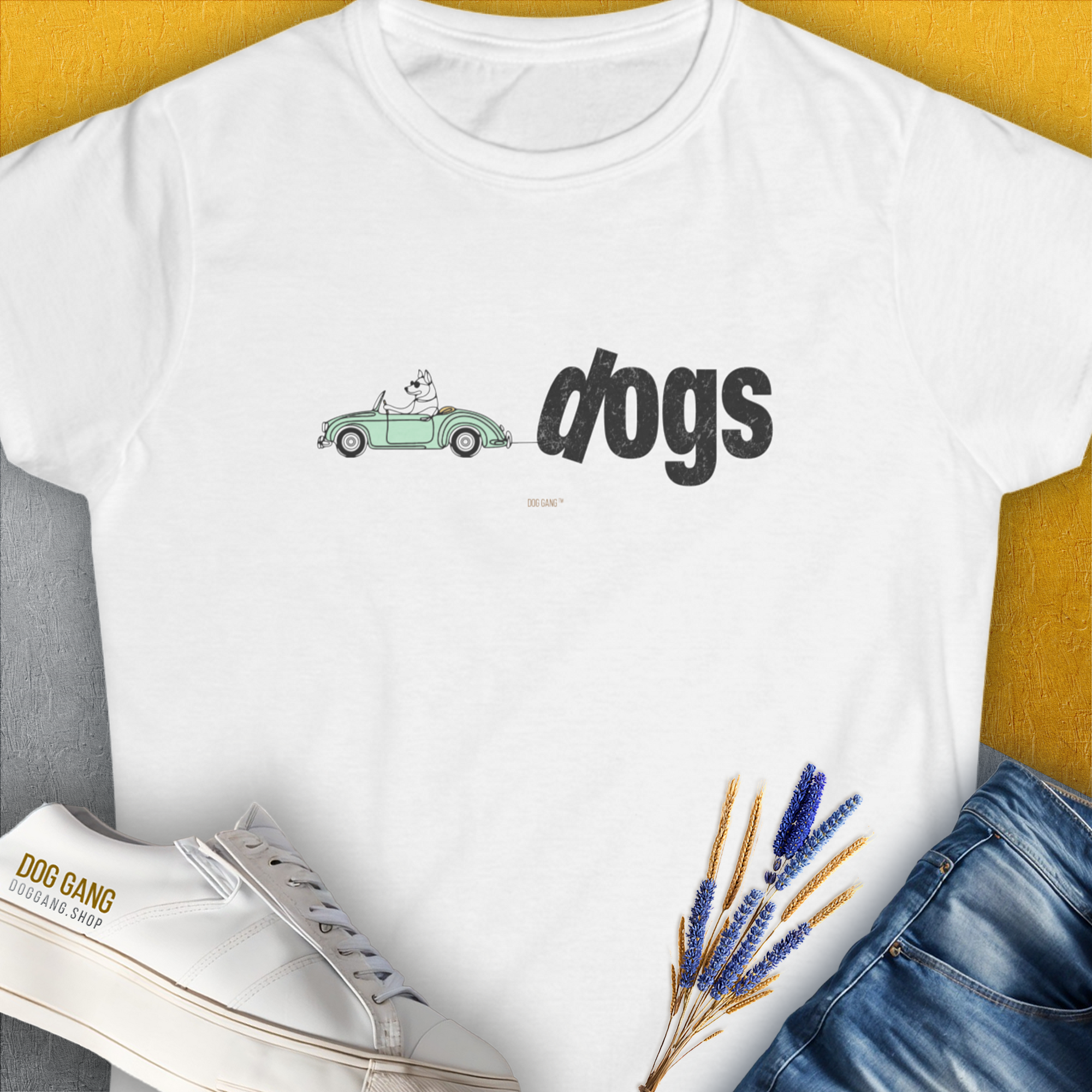 Cute dog design with a playful pup driving a car and the word dogs included. Perfect for any dog lover. Designed by Dog Gang.