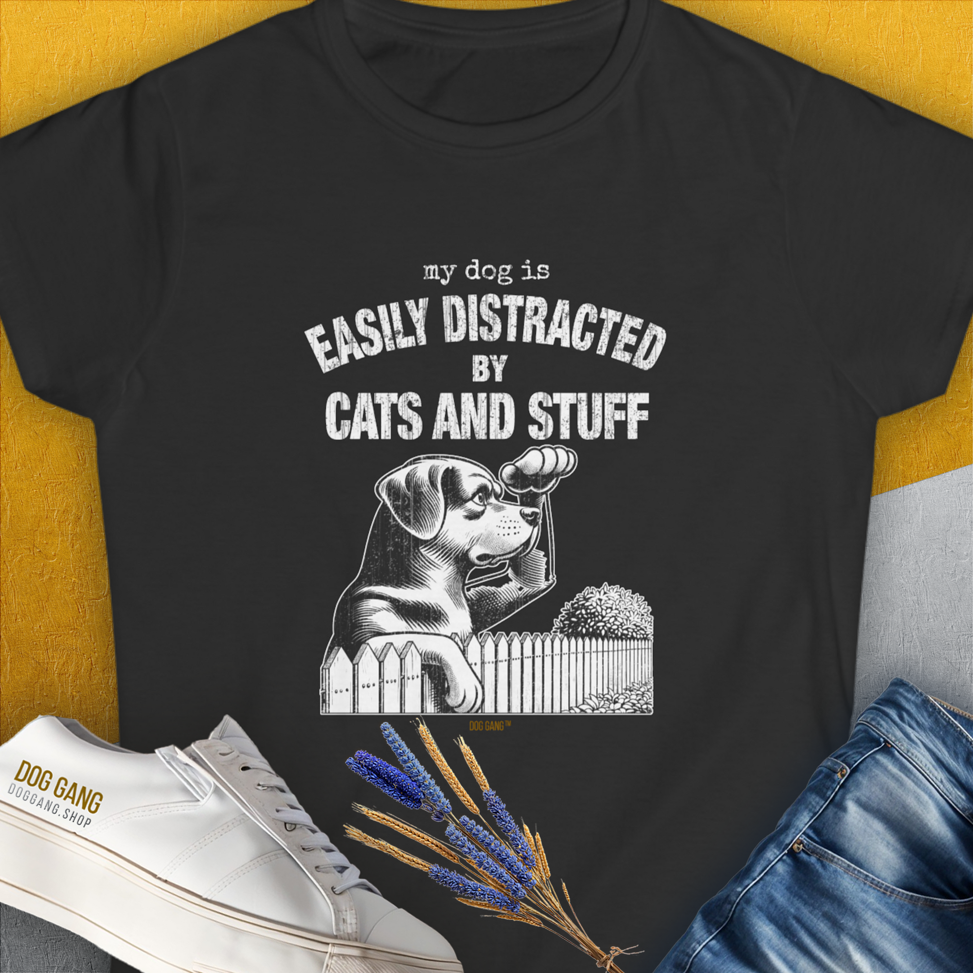 Black tee with a cute dog cartoon, featuring the phrase Easily Distracted by Cats and Stuff. Perfect for any dog person or funny dog shirt enthusiast. Designed by Dog Gang.