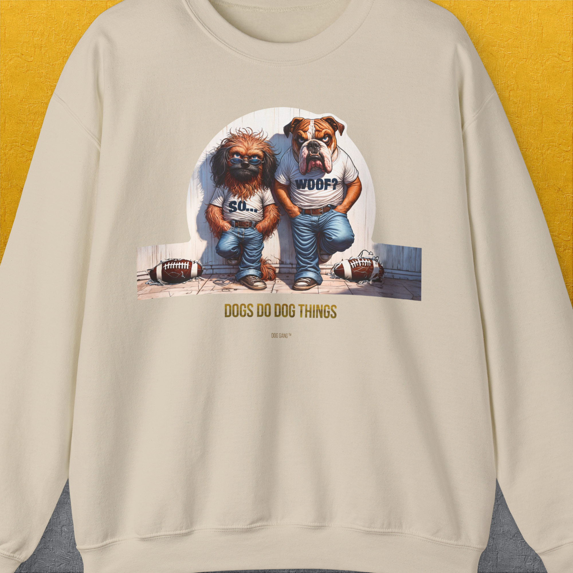 The legendary &quot;So... Woof?&quot;-series Volume 7. Funny Unisex Sweatshirt features a design with two playful dogs in tees and two shredded rugby balls. The sayings &quot;SO... WOOF? and DOGS DO DOG THINGS&quot; add humor. Designed by Dog Gang.