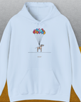 Funny dog shirt: A cartoon dog holding colorful balloons. Designed by Dog Gang.