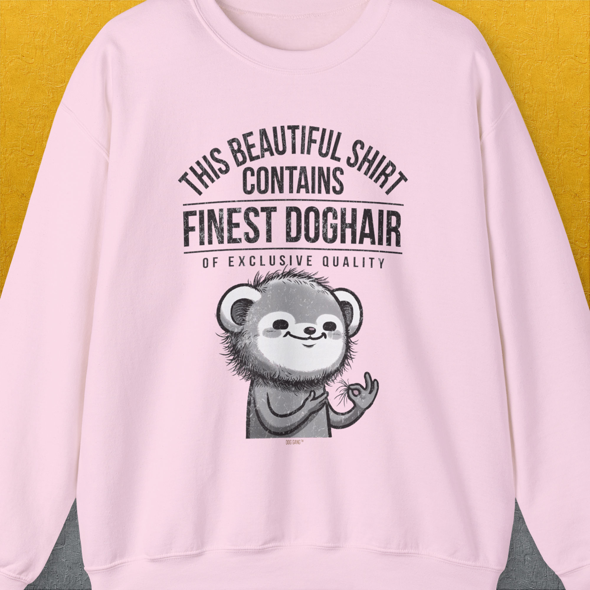 Light pink shirt with cute cartoon dog and saying, This Beautiful Shirt Contains Finest Dog Hair Of Exclusive Quality, Volume 2. Crafted from ethically grown US cotton. Designed by Dog Gang.