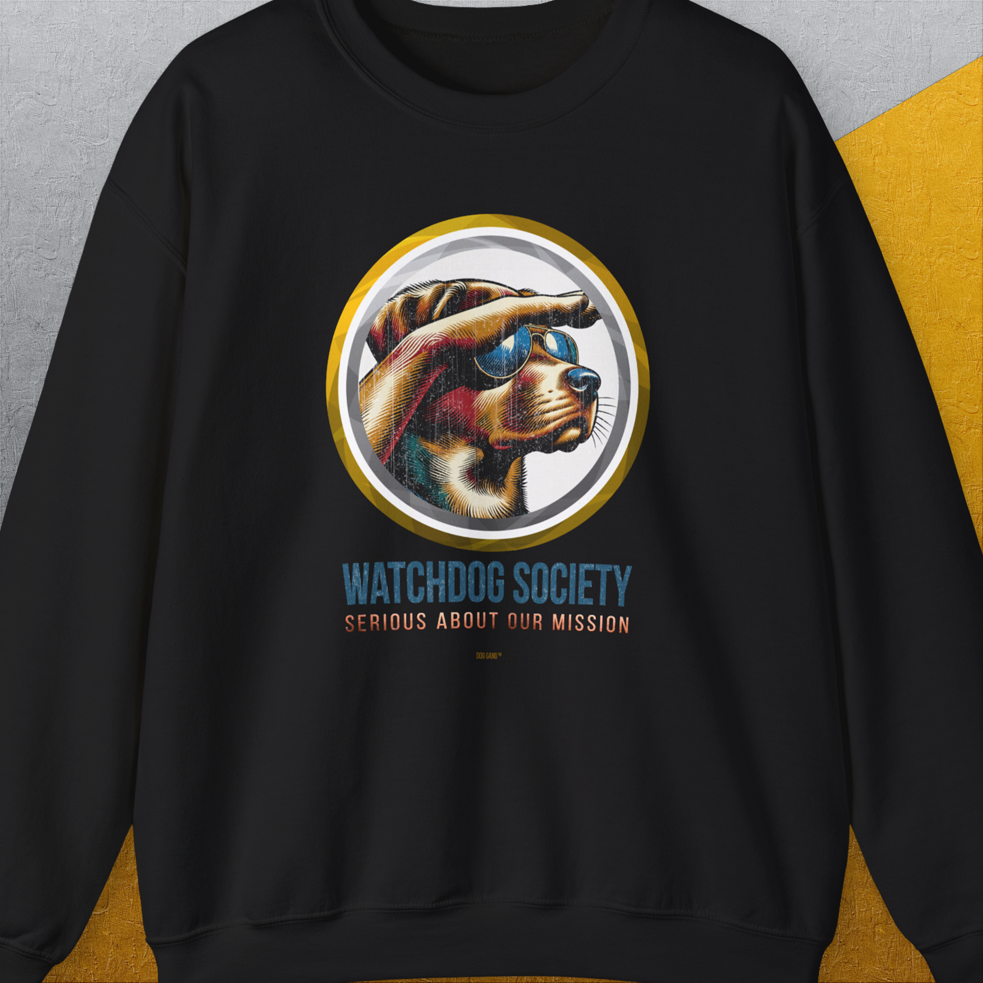Funny dog shirt with a cool dog in sunglasses looking into the distance. Features the phrase: Watchdog Society: Serious About Our Mission. Designed by Dog Gang.