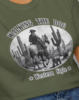 Walking The Dog, Western Style, Volume 1, Unisex T-Shirt-, a fun and stylish design for dog lovers from Dog Gang